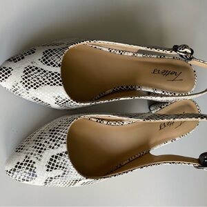 Trotters sling back shoes. Size6.5 White/black snake skin pattern.